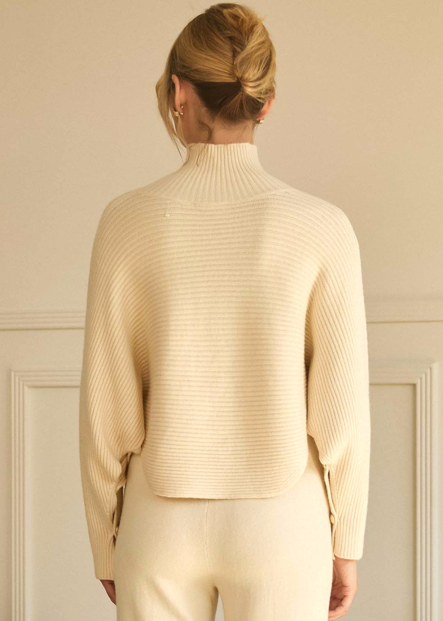 ASYMMETRICAL MOCKNECK SWEATER