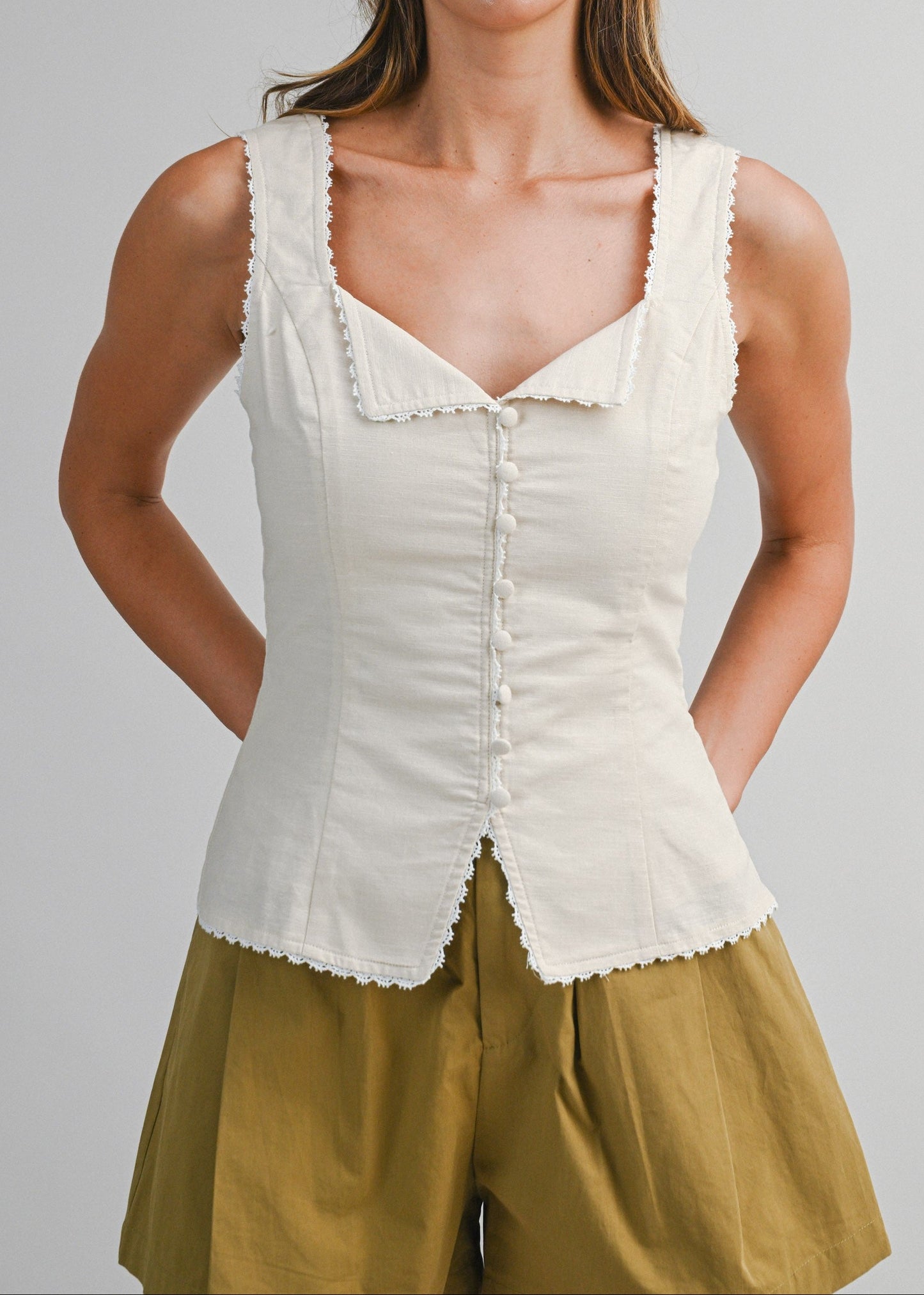 white sleeveless top with lace trim 