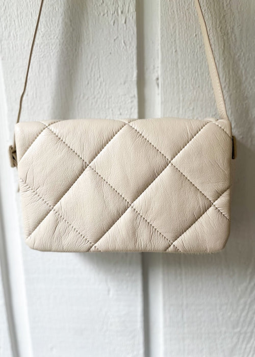 white quilted purse